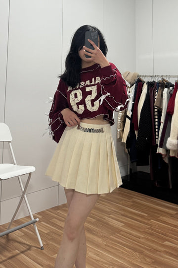 Short sweatshirt with bows