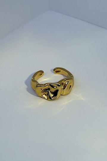 Anel em aço dourado texturizado ajustável