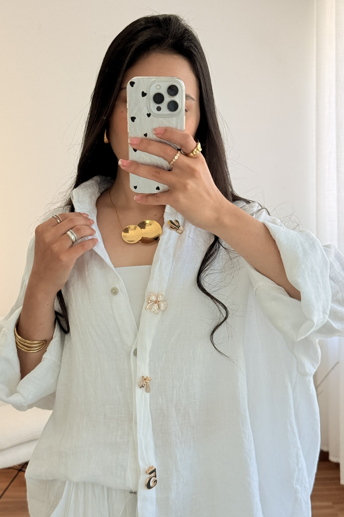 Colar minimalista com pêndulos em aço dourado