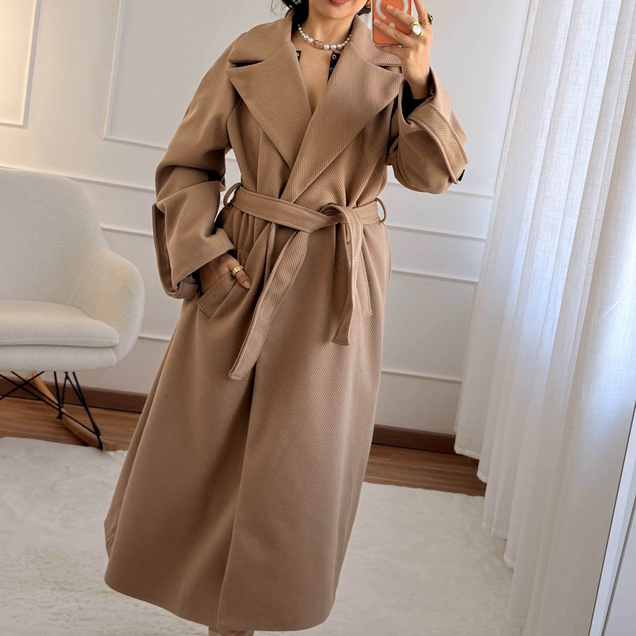 Casaco comprido com cinto