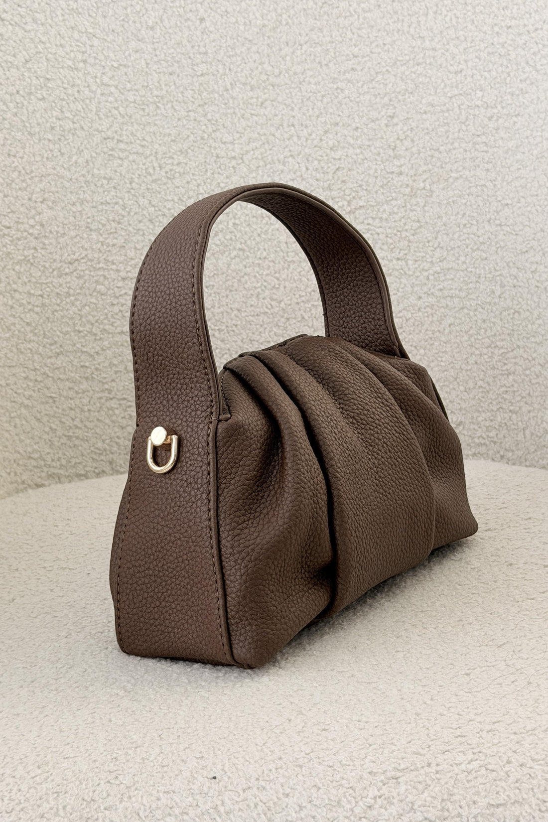 Bolsa de mão plissada