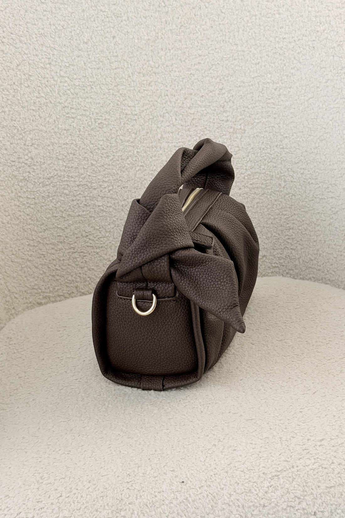 Bolsa de mão com laço