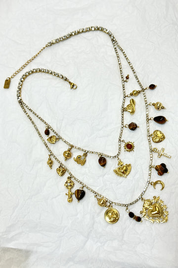 Colar vintage dourado com pendentes e cristais