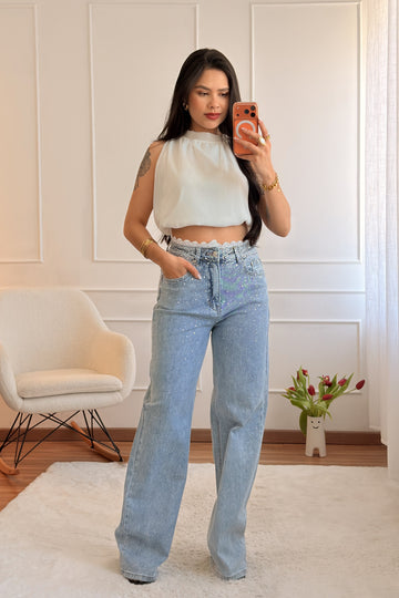 Calça de ganga com aplicações de brilho