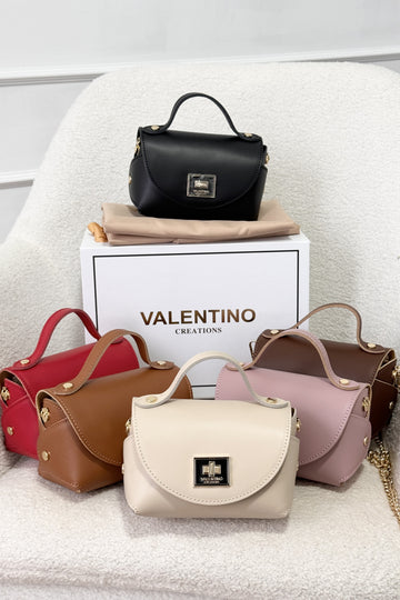 Bolsa Valentino em pele com corrente dourada