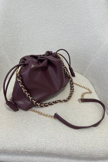 Bolsa macio com corrente dourada S