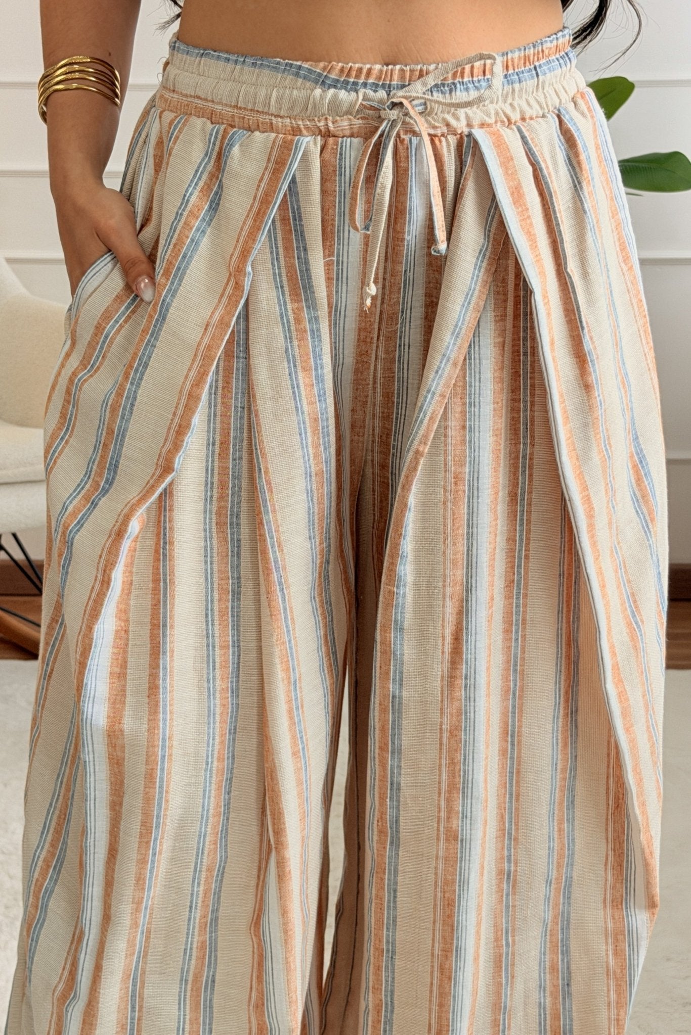 Calça com padrão às riscas LUMINA - lavishiochicCalçalumina