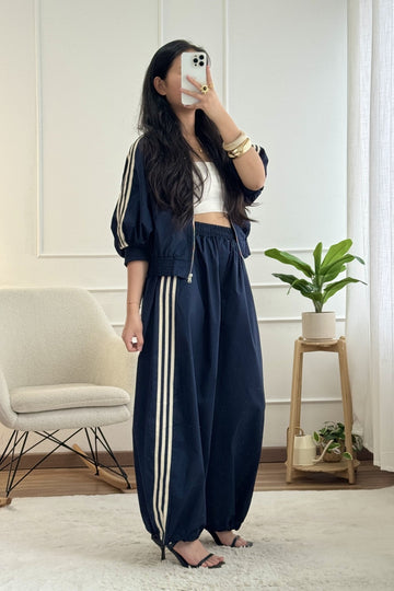Calça desportiva com riscas laterais LUMINA - lavishiochicCalçaslumina